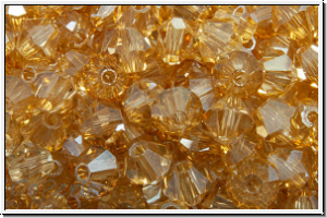 Preciosa� Bicone, 4mm, crystal, trans., golden flare, full, 50 Stk.